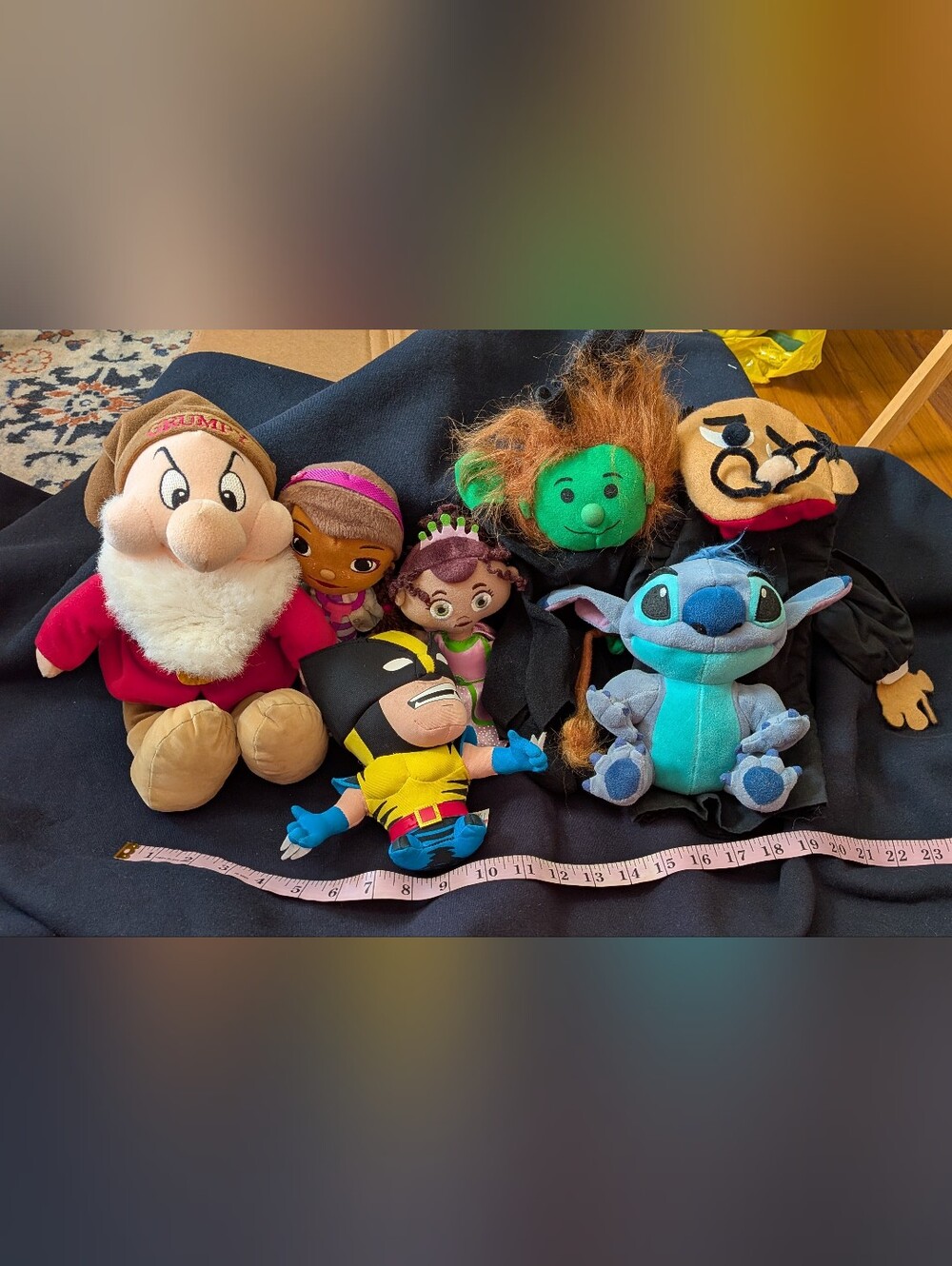 Seven Characters Puppets Stitch Wolverine Doc McStuffins Disney